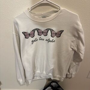 White Sweatshirt with Pink Butterfly Design